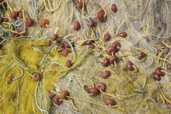 Kassiopi, Corfu, Greece, Colourful fishing nets in the harbour of Kassiopi, a small harbour town in