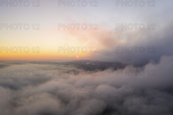 The sun rises above the fog, Elbe Valley, Saxony, Germany, Europe