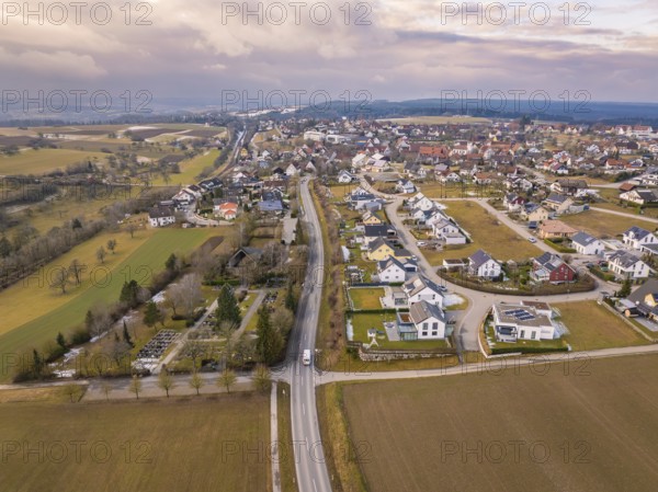 Rural street scene with neighbouring houses and fields in a suburban area, Schopfloch, Freudenstadt