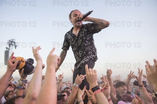 Ingo Knollmann, singer of the Donots at the Crodwsurfing at the Highfield Festival on Friday,