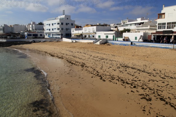 Sandy beach backed by bars and hotels in Corralejo, Fuerteventura, Canary Islands, Spain, Europe