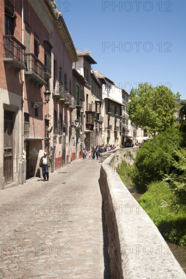 Historic buildings on Carrera del Darro by the Rio Darro river, Granada, Spain, Europe