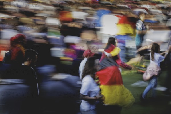 Fans react during the European Championship preliminary round match between Germany and Hungary on