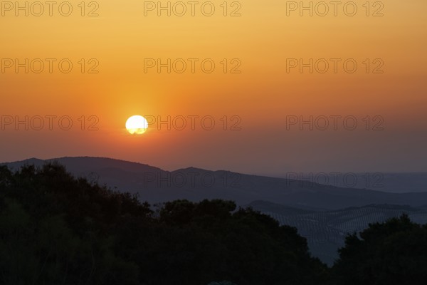 Sunset over mountain range, Sierras Subbeticas Natural Park, near Zuheros, Cordoba province,