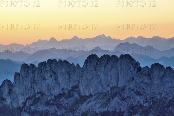 Fribourg Prealps with Gastlosen mountain range at dawn, Bernese Alps behind, cantons of Fribourg
