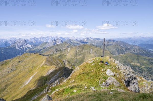 Summit of the Hochspitz or Monte Vacomun, view of the mountain ridge of the Carnic Main Ridge,
