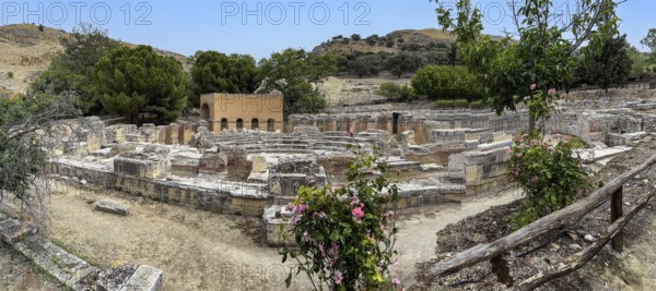 Panoramic view of ruins of historic Roman amphitheatre from antiquity in excavation site remains of
