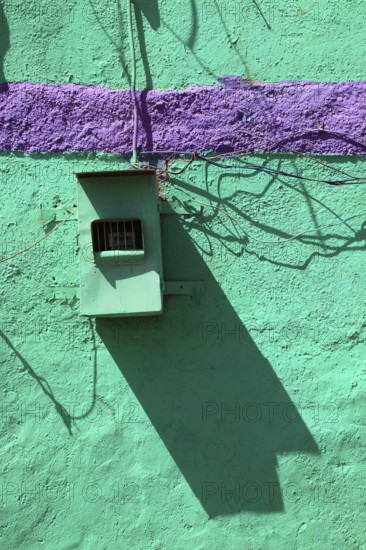 Colourful house wall, turquoise and purple, electrical wiring, Ethiopia, Africa
