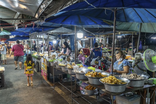 Food stalls at the night market in Trat, Thailand, Asia