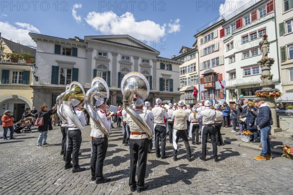 Historically costumed guildsmen in Zurich's Old Town, stand concert at Münzplatz, Zunft zum Weggen,