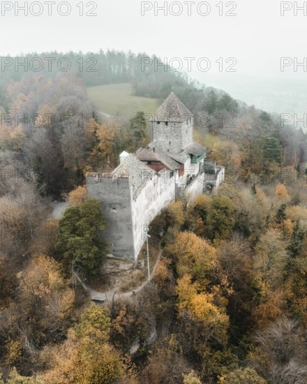 Aerial view of Hohenklingen Castle above Stein am Rhein on a foggy autumn day, Canton Schaffhausen,