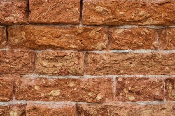 Detail of an old ziggurat wall made of bakestone bricks, Venice Italy
