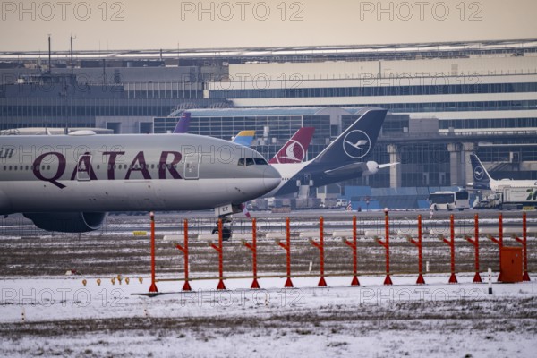 Aircraft on the taxiway at Frankfurt FRA airport, Fraport, in winter, Hesse, Germany, Europe