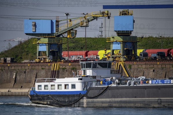 Loading cranes at Schwelgern harbour, ThyssenKrupp Steel, cargo ship on the Rhine, Duisburg, North