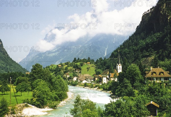 Presumably the river Reuss and the village of Amsteg, Canton Uri, Switzerland, Europe 1950s, Europe