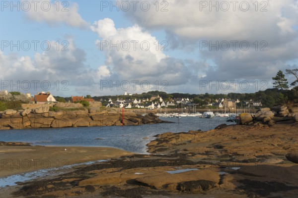 View of a coastal village with rocks and clouds in the sky, Trégastel, Tregastel, Ploumanac'h,