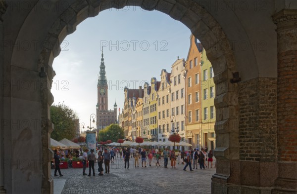 View through an archway, Green Tor, to the city centre of Gdansk. Gdansk, Pomerania, Poland, Europe