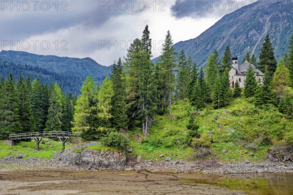 Lake chapel Maria am See, Obernberger See, mountain lake, landscape of the Stubai Alps, weather
