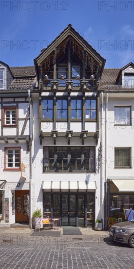 Bells on a house on Marktstraße in Bad Münstereifel, Eifel, Euskirchen district, North