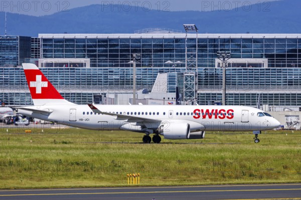 A Swiss Airbus A220-300 aircraft with the registration HB-JCI at the airport in Frankfurt, Germany,