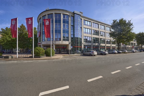 Head office of Niederrheinische Sparkasse RheinLippe with flags on Bismarckstraße in Wesel, Lower
