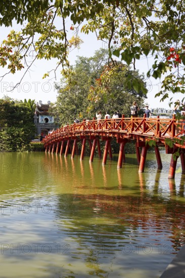 Huc Bridge (red bridge), entrance to Ngoc Son Temple on Hoan Kiem Lake, Hanoi, Vietnam, Asia