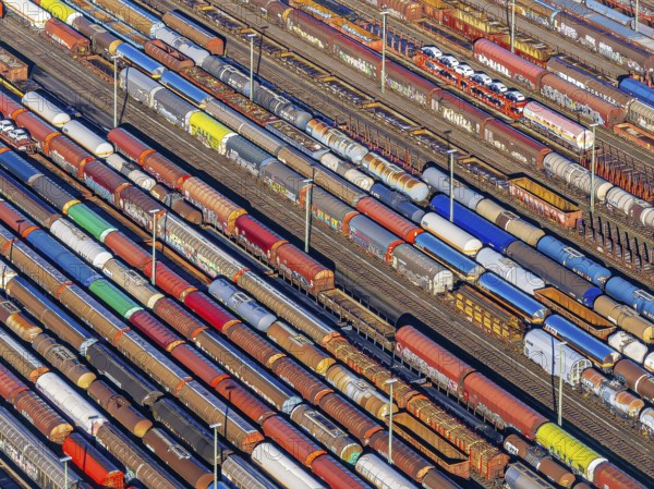 Deutsche Bahn AG marshalling yard. Many goods trains are parked on the tracks with tank wagons, car