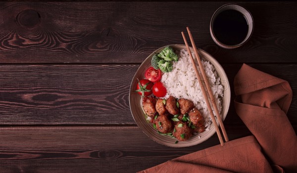 Asian traditional cuisine, fried chicken Teriyaki, with side dish, rice and vegetables, top view,