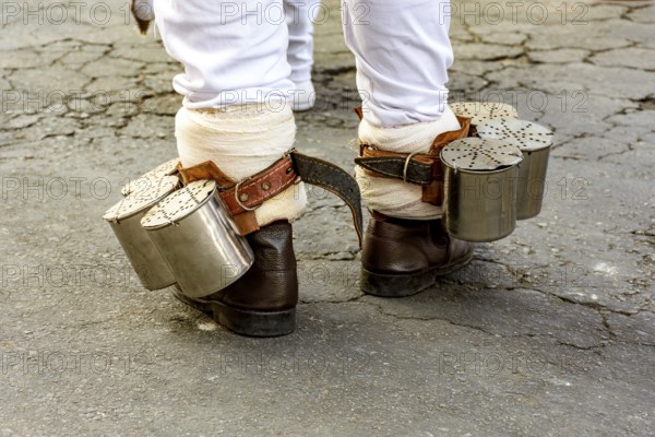 The rattle attached to the feet of the rhythmist is very common in some Afro-Brazilian cultural