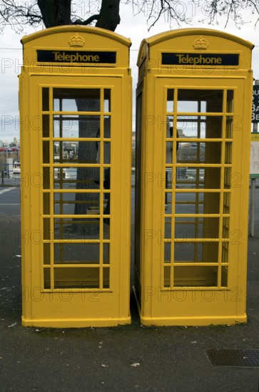 Two yellow telephone boxes, St Peter Port, Guernsey, Channel Islands, UK, Europe
