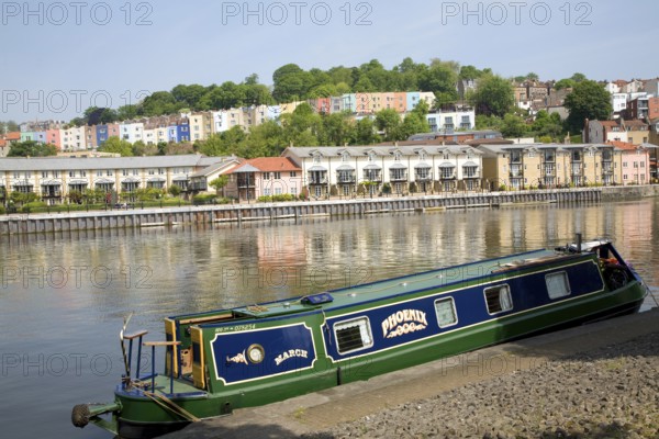 Colourful houses on hillside Clifton, Hotwells, from Floating Harbour, River Avon, Bristol,