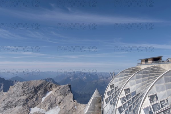 View of the Alps from the Zugspitze, on the right the radio transmission station, on the left the