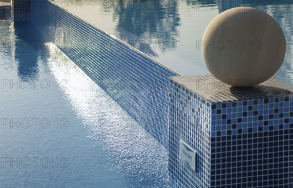 Pool area, water reflections, close-up