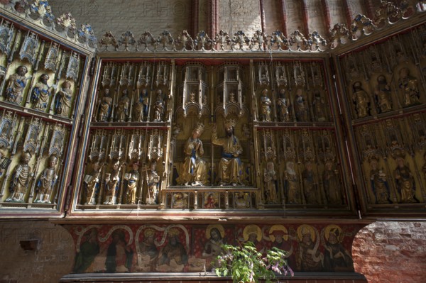 Altar retable from 1430 from St Georgen set up in St Nikolai's Church, late Gothic brick building,