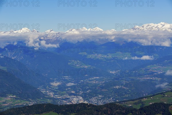 Panoramic view of Ortisei, surrounded by mountains, under a cloud cover, Val Gardena, South Tyrol,