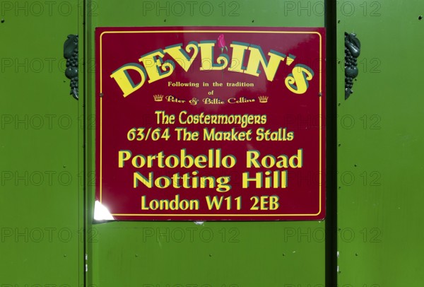 Sign for fruit and vegetable shop Devlin's, Portobello Road, Notting Hill, London, England, Great
