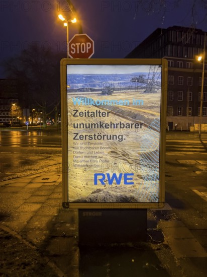 Alleged advertising poster of the energy company RWE, which professes the environmental destruction
