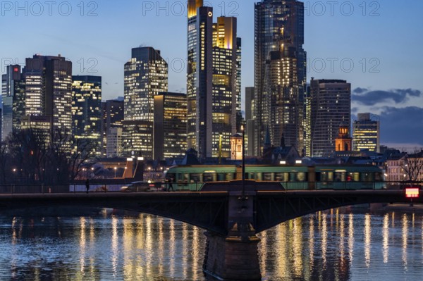 Skyline of the city centre of Frankfurt am Main, river Main, dusk, Ignatz-Bubis-Brücke, Hesse,