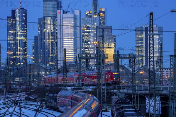 Railway tracks in front of the main railway station in Frankfurt am Main, skyline of skyscrapers in