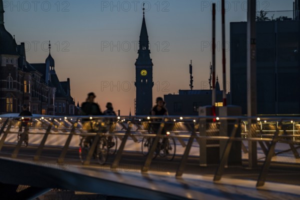 Cyclists on the Lille Langebro cycle and pedestrian bridge over the harbour, Copenhagen is