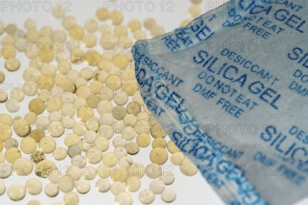 Silica gel, desiccant, is often used in packaging for technical devices, packed in small bags,