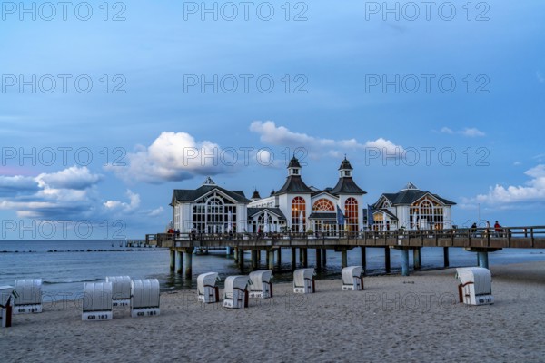 The pier of Sellin, evening mood, sunset, 394 metres long, with restaurant, jetty, beach chairs,