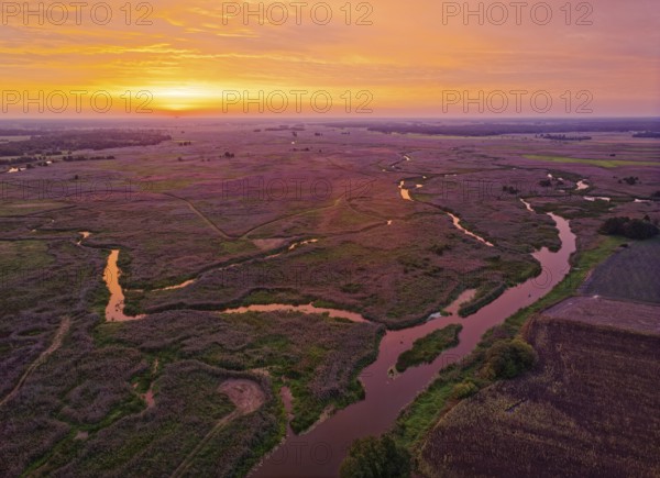 Sunrise over the meandering riverbed of the Narew and the Narew National Park, Narwianski Park