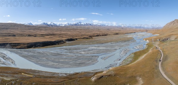 Aerial view, Burkhan mountain valley with meandering river, barren dramatic mountain landscape,