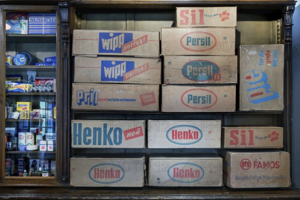 Cardboard boxes of detergents from the 1950s in a former Thuringian drugstore from 1898, set up as
