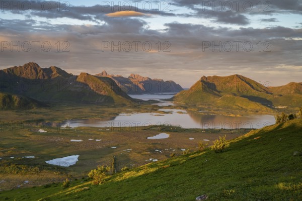 View of the coast and mountains from Mount Hoven, Gimsoy, Lofoten, Norway, Europe