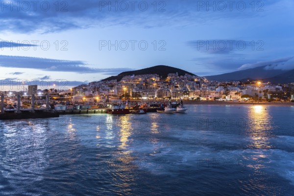 City view of Los Cristianos and the harbour at dusk, Tenerife, Canary Islands, Spain, Europe