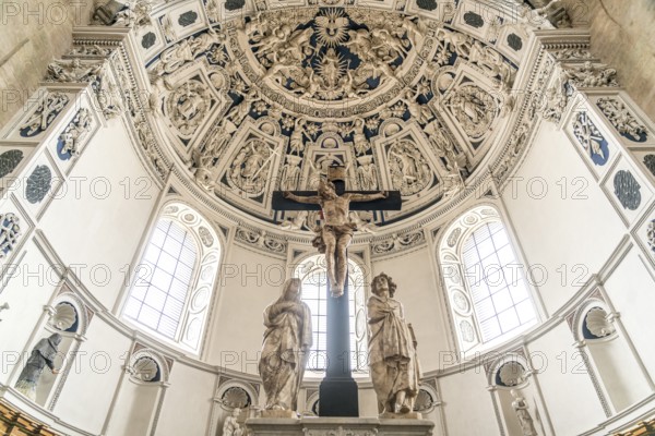 Crucifix and Baroque stucco work on the vault of the west choir in the interior of St Peter's