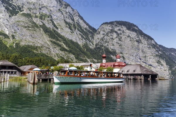 Pilgrimage church St. Bartholomä at Königssee with excursion steamer, Berchtesgaden National Park,