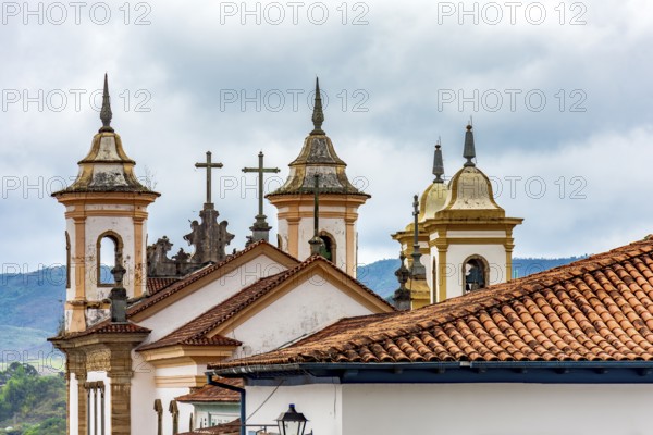 Towers and crucifixes of a baroque church in the historic city of Mariana in Minas Gerais Mariana,